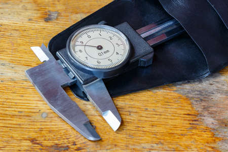 Slide caliper with a round dial in a storage caseの写真素材