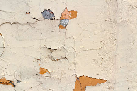 Pink concrete wall with scratches and damages. Abstract background
