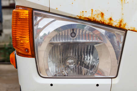 Headlight of a old truck closeup. Front viewの写真素材