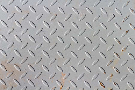 Textured metal sheet painted with gray paint. Abstract background