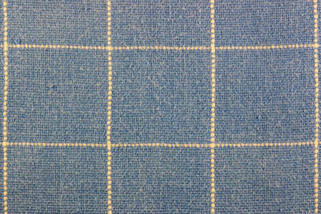 Abstract texture of blue cotton fabric with vertical and horizontal dots linesの写真素材