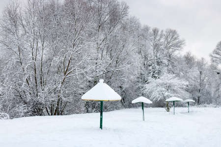 Snow covered beach after a snowfall on a cloudy winter day. Winter landscapeの写真素材