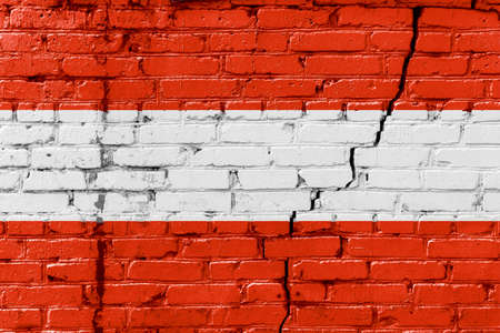 Austrian flag painted on an old brick wallの写真素材