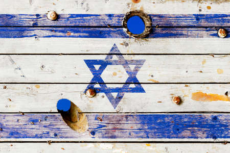 Israeli flag painted on old weathered boardsの写真素材