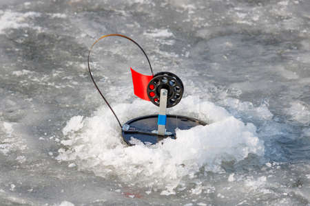 Fishing tackle for winter fishing on ice of a frozen lake