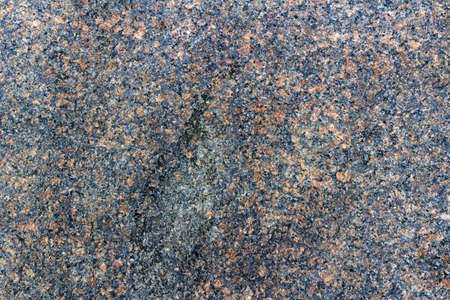 Grey granite slab closeup. Texture of natural stone