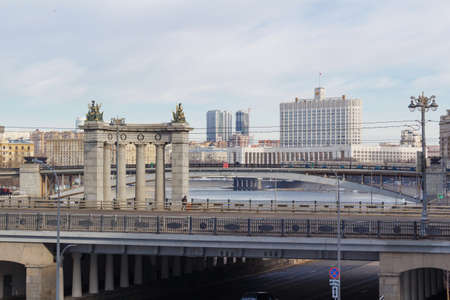Moscow, Russia - March 25, 2018: Building of Russian Federation Government House against the backdrop of bridges across the Moskva riverのeditorial素材