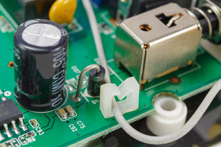 Printed circuit board with installed electronic components closeup