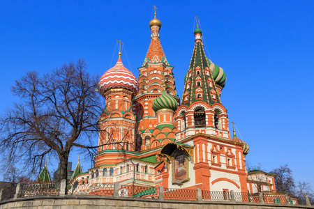 The bell tower and dome of St. Basil's Cathedral on a sunny morning. Spring in Moscowの写真素材