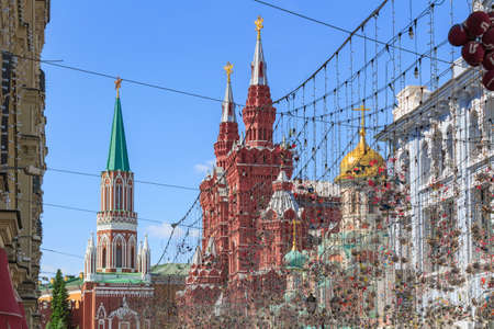 Moscow, Russia - June 03, 2018: Tower of Moscow Kremlin and building of State Historical Museum against blue sky in sunny summer morningのeditorial素材