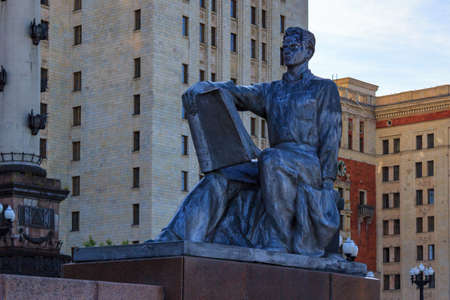Moscow, Russia - June 02, 2018: Monument to Student with a book at entrance to building of Lomonosov Moscow State University (MSU)のeditorial素材