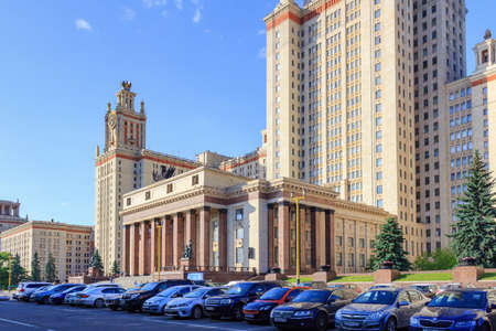 Moscow, Russia - June 02, 2018: Entrance to the building of Lomonosov Moscow State University (MSU) against parked cars in sunny summer eveningのeditorial素材