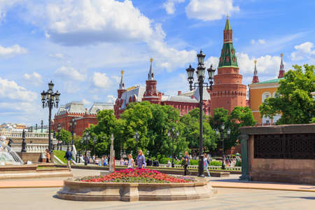 Moscow, Russia - June 03, 2018: Walking tourists on Manezhnaya Square on a background of Moscow Kremlin on a sunny summer morningのeditorial素材