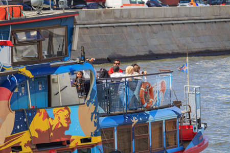 Moscow, Russia - June 21, 2018: Tourists travel by pleasure boat on Moskva river on a sunny summer dayのeditorial素材