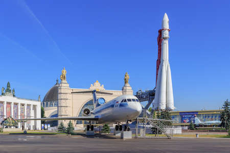 Moscow, Russia - August 01, 2018: Soviet airliner Yak-42 and Vostok booster rocket on Exhibition of Achievements of National Economy (VDNH) in Moscow on a sunny summer morning against blue skyのeditorial素材