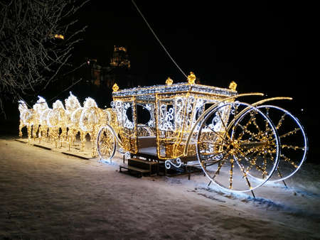 Moscow, Russia - December 17, 2018: Horse drawn carriage luminescent installation in Tsaritsyno park in Moscow at winter nightのeditorial素材