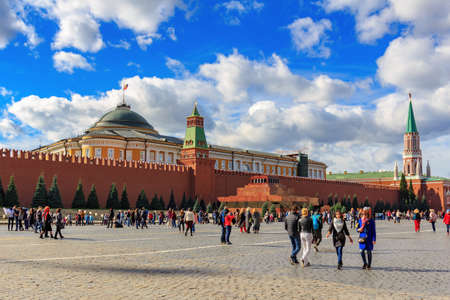 Moscow, Russia - September 30, 2018: Tourists walk on Red square on a background of Moscow Kremlin in sunny dayのeditorial素材