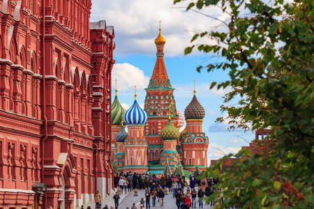 Moscow, Russia - September 30, 2018: View of St. Basil Cathedral on a background of walls of State Historical Museum in sunny dayのeditorial素材