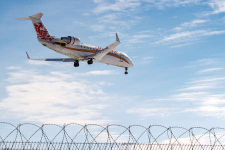 Moscow, Russia - March 14, 2019: Aircraft Bombardier CRJ-100ER (CL-600-2B19) VP-BNM of Rusline Airine going to landing at Vnukovo airport in Moscow on a blue sky background at sunny dayのeditorial素材