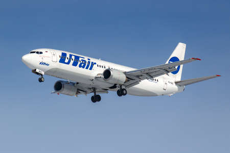 Moscow, Russia - March 14, 2019: Aircraft Boeing 737-400 VQ-BHZ of UTair Aviation going to landing...