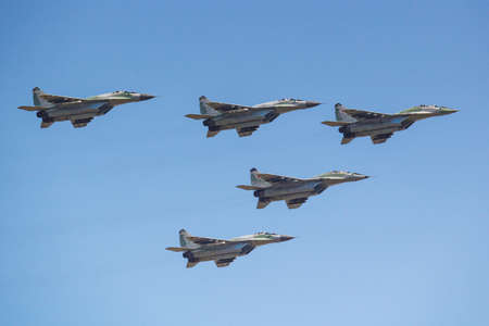 Moscow, Russia - May 07, 2019: Fourth generation multipurpose fighter MiG-29SMT in the blue sky over...
