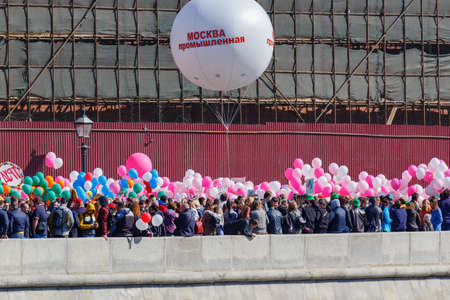 Moscow, Russia - May 01, 2019: Demonstrators with colored balloons on Kremlevskaya embankment. May Day celebration in Moscowのeditorial素材