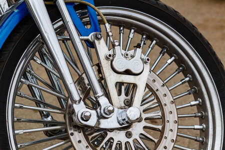 Moscow, Russia - May 04, 2019: Front wheel with disc brake system of Harley Davidson motorcycle...