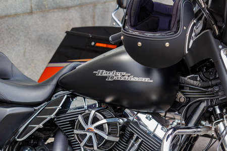 Moscow, Russia - May 04, 2019: Matte black fuel tank of Harley Davidson motorcycle with emblem...