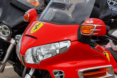 Moscow, Russia - May 04, 2019: Headlights in bright red windproof shield of tourist trike Honda Gold...
