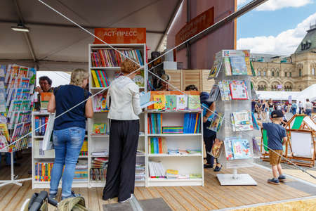 Moscow, Russia - June 02, 2019: Visitors near stands with books at the Book festival Red Square 2019 in Moscowのeditorial素材