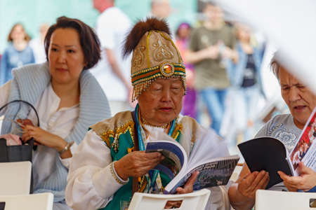 Moscow, Russia - June 02, 2019: Participant of Book festival Red Square 2019 in Moscow in national costumesのeditorial素材