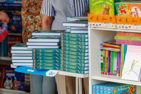Moscow, Russia - June 02, 2019: Children literature on the stand closeup at the Book festival Red Square 2019 in Moscowのeditorial素材