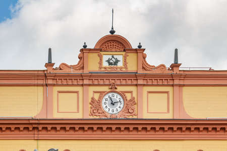Moscow, Russia - June 02, 2019: Clock under roof on the facade of building of KGB on Lubyanka Square in Moscow. Architecture of the historical center of Moscowのeditorial素材