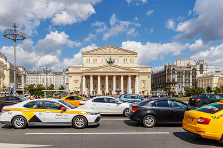 Moscow, Russia - June 02, 2019: Bolshoi Theatre in Moscow against blue sky with white clouds in...
