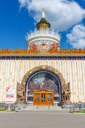 Moscow, Russia - July 22, 2019: Main entrance to the Ukraine pavilion on VDNH in Moscow on a blue sky background. VDNH park architecture at sunny summer morningのeditorial素材