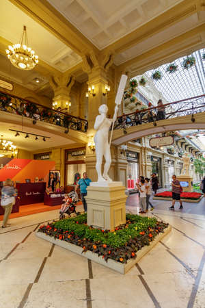 Moscow, Russia - July 28, 2019: Plaster statue of woman with a paddle in GUM State Department Store on Red square in Moscowのeditorial素材