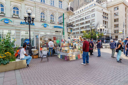 Moscow, Russia - September 13, 2019: People near counter with rare books on Arbat street in Moscow at sunny autumn morningのeditorial素材