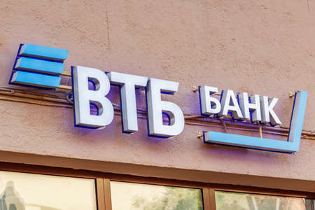 Moscow, Russia - September 13, 2019: VTB Bank sign. Signboard of soviet and russian universal commercial bank VTB above office windowsのeditorial素材