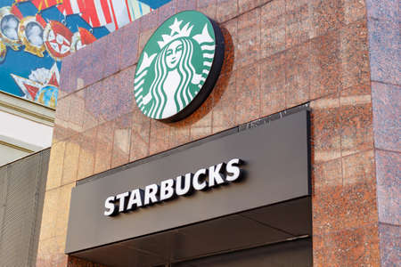 Moscow, Russia - September 13, 2019: Starbucks signboard above entrance to the coffee house on Old Arbat street in Moscow. Starbucks signのeditorial素材