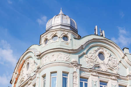 Moscow, Russia - September 13, 2019: Architecture of Moscow downtown. Vintage building with tower on the corner on a blue sky background close-up at sunny dayのeditorial素材