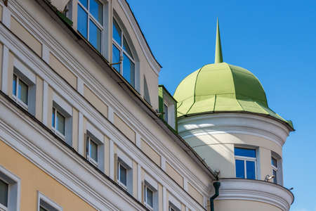 Moscow, Russia - September 21, 2019: Fragment of residential building facade in Moscow downtown against blue sky at sunny morning. Moscow architectureのeditorial素材