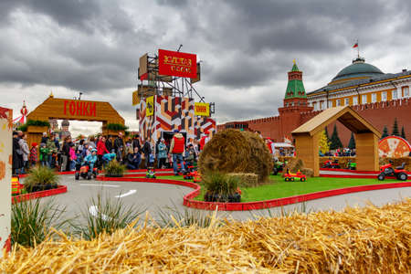 Moscow, Russia - October 05, 2019: View of the race track of the children attraction Racing on Red Square at cloudy day. Traditional festival Golden Autumn in Moscowのeditorial素材