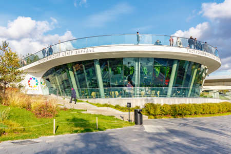 Moscow, Russia - October 08, 2019: Contemporary building with round glass facade of Gastronomic center in Zaryadye Park at sunny autumn dayのeditorial素材