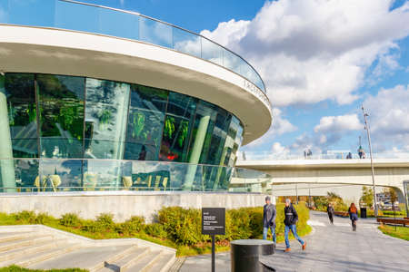 Moscow, Russia - October 08, 2019: People walking on alleys in Zaryadye Park at sunny autumn day. Zaryadye Park is famous touristic place in Moscowのeditorial素材