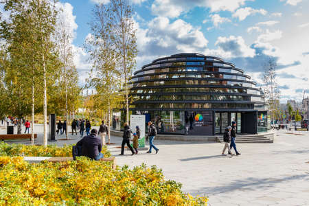 Moscow, Russia - October 08, 2019: People walking near Zaryadye Dome building in sunny autumn day. Zaryadye Park is popular touristic landmark in Moscowのeditorial素材