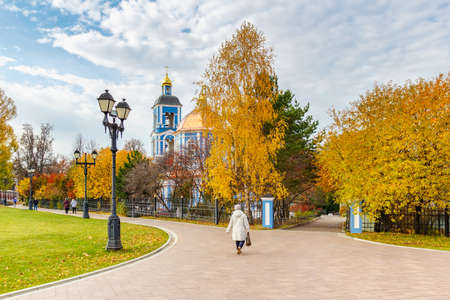 Moscow, Russia - October 16, 2019: Autumn landscape of Tsaritsyno Park in Moscow. Orthodox church against autumn trees at sunny autumn dayのeditorial素材