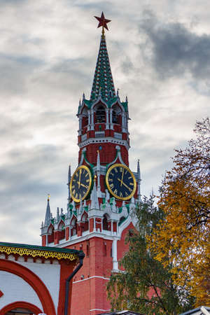 Moscow, Russia - October 08, 2019: Spasskaya tower of Moscow Kremlin against cloudy sky in autumn evening. Moscow Kremlin architectureのeditorial素材