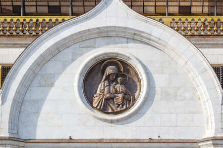 Moscow, Russia - October 03, 2019: High reliefs of saints on the facade of Cathedral of Christ the...