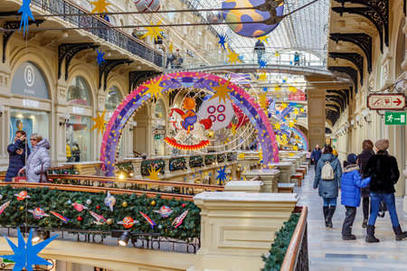 Moscow, Russia - November 21, 2019: Christmas in Moscow. Christmas interiors of GUM State Department Store on Red square. GUM is a popular touristic place in Moscow historical centerのeditorial素材