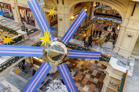 Moscow, Russia - November 21, 2019: Bright space station layout above alleys of GUM State Department Store. New Year installations at GUM interiors on Red square in Moscowのeditorial素材